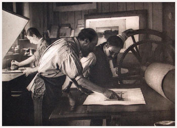 Frederick Goulding examining a proof with Martin Hardie