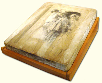 A lithographic stone with a lithographic drawing on its surface